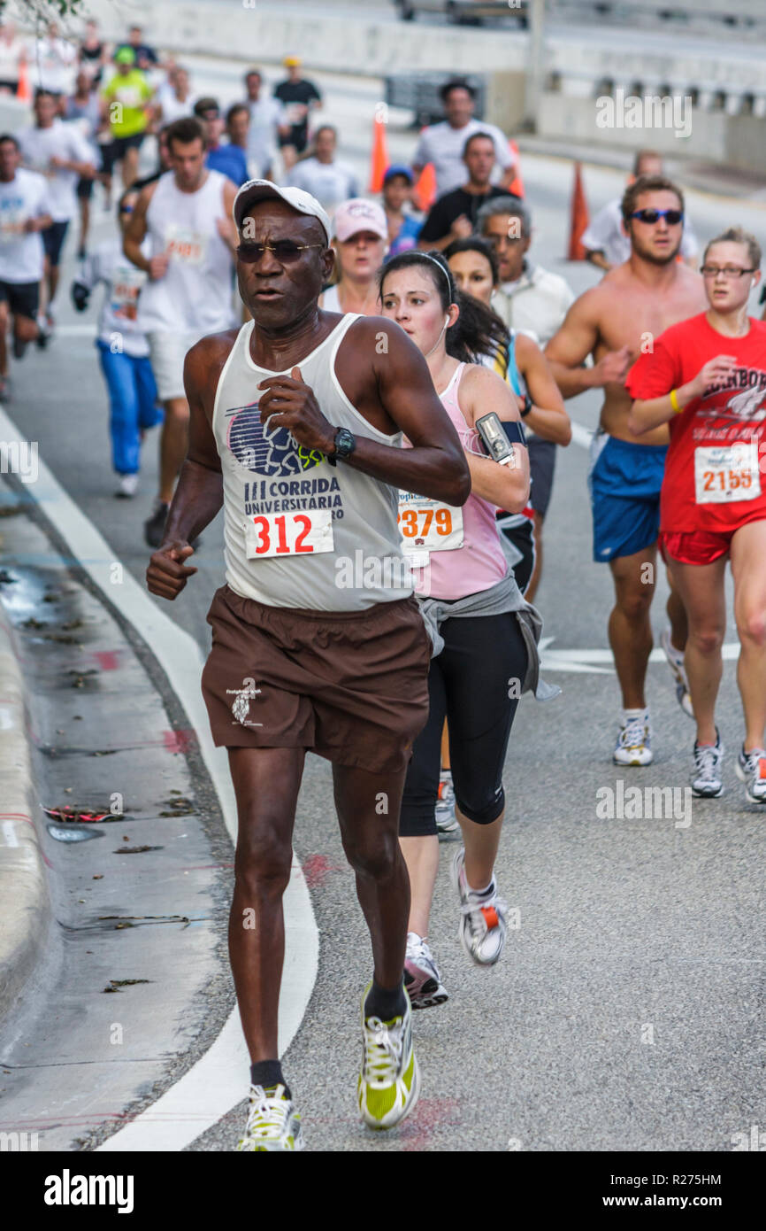 Miami Beach Florida,Blue Cross & Blue Shield Tropical 5K Run,race,runner,endurance,sports,fitness,Black man men male,woman female women,road race,comp Stock Photo