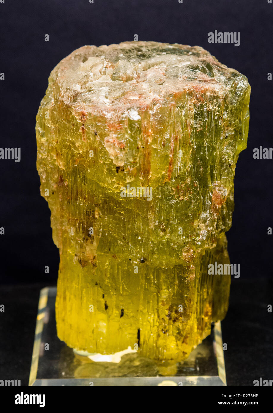 Yellow crystal of rare mineral Heliodor, a variety of beryl. Stock Photo