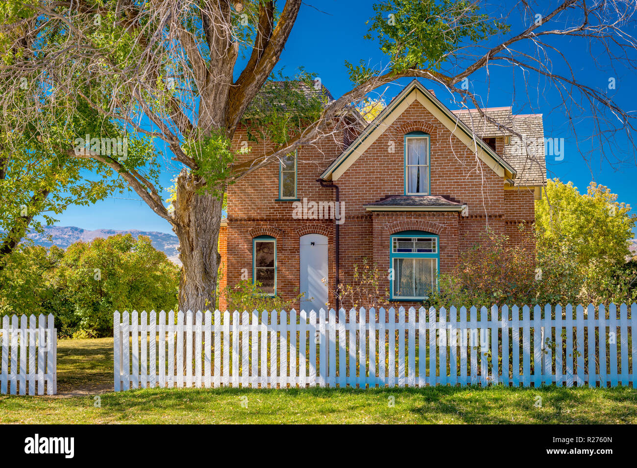 Farmhouse With Trees And White Picket Fence On It Boarded Stock Photo Alamy Farmhouse With Trees And White Picket Fence On It Boarded Stock Photo Alamy