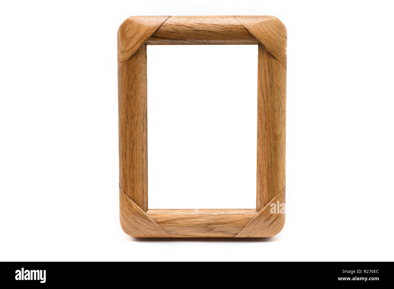 Vintage wooden photo frame on an isolated white background Stock Photo