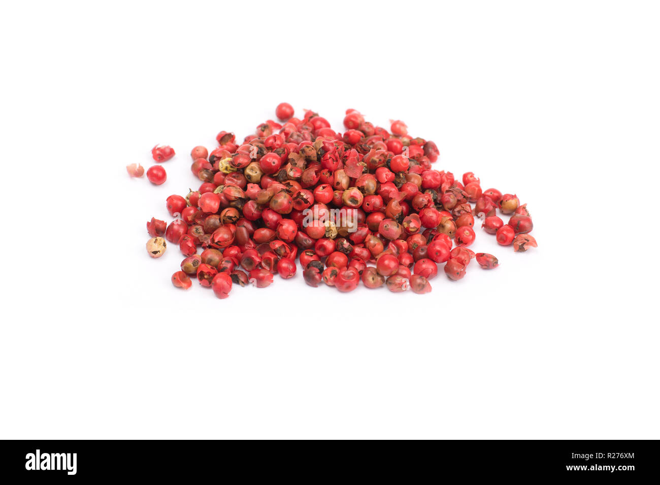 pink peppercorns isolated on white background, dried berries of