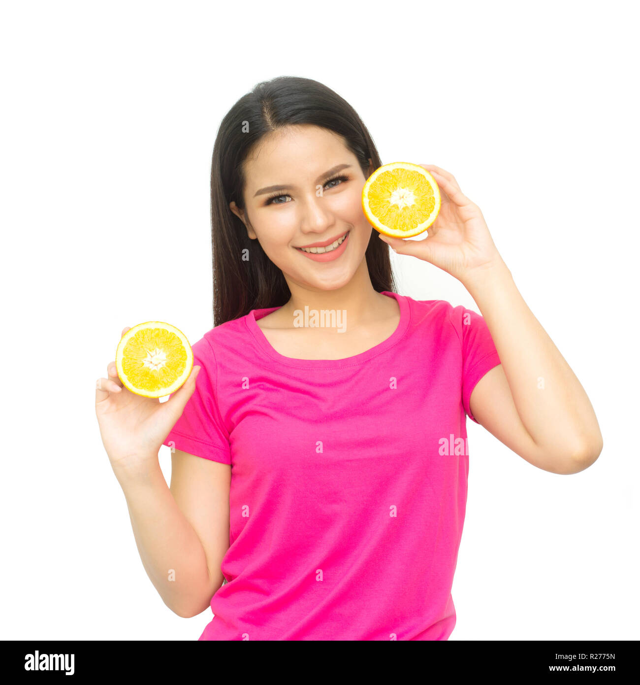 Health girl show yellow orange with smile face isolated on white background, healthy eating food concept Stock Photo