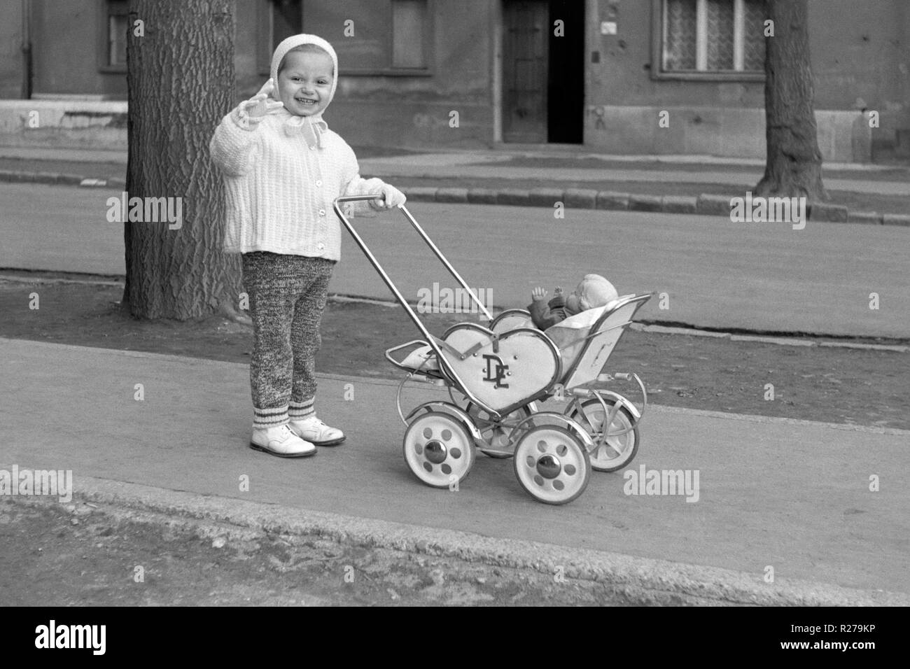 black dolls pram