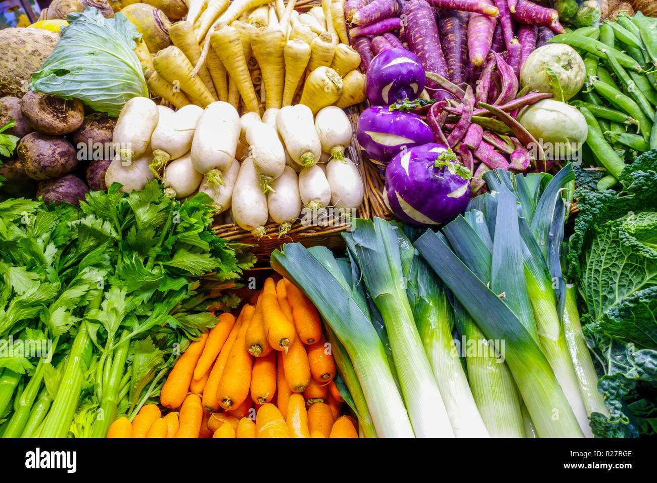 Fresh vegetable market stall variety of roots vegetables, Alicante Spain Stock Photo