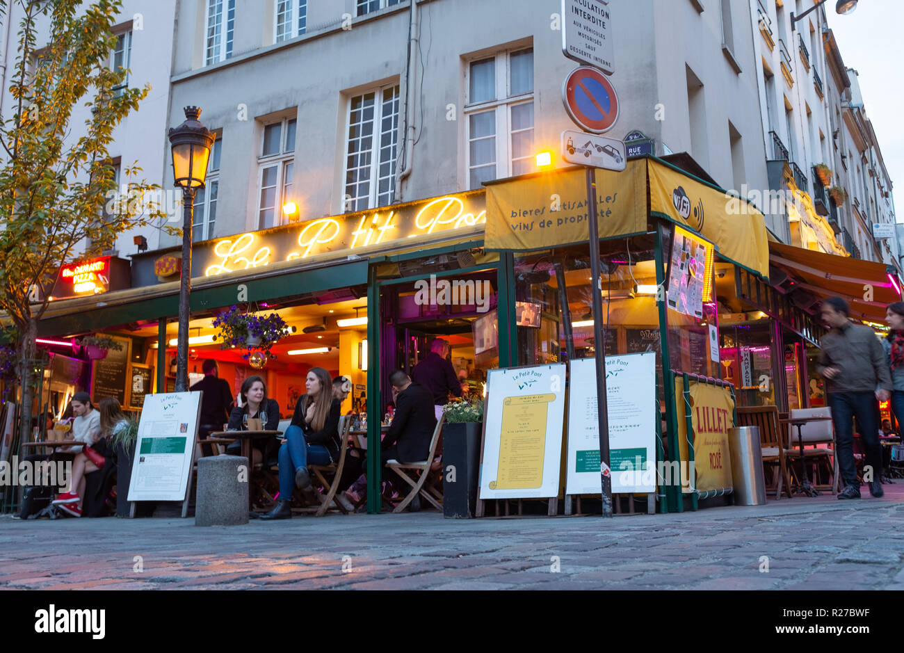 Exterior view of Le Petit Pont  restaurant in Quartier Latin at dusk, Paris, France Stock Photo