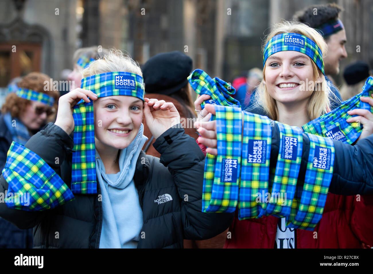 Rugby fans wear charity headbands during &lsquo;The Gathering of 10,000 