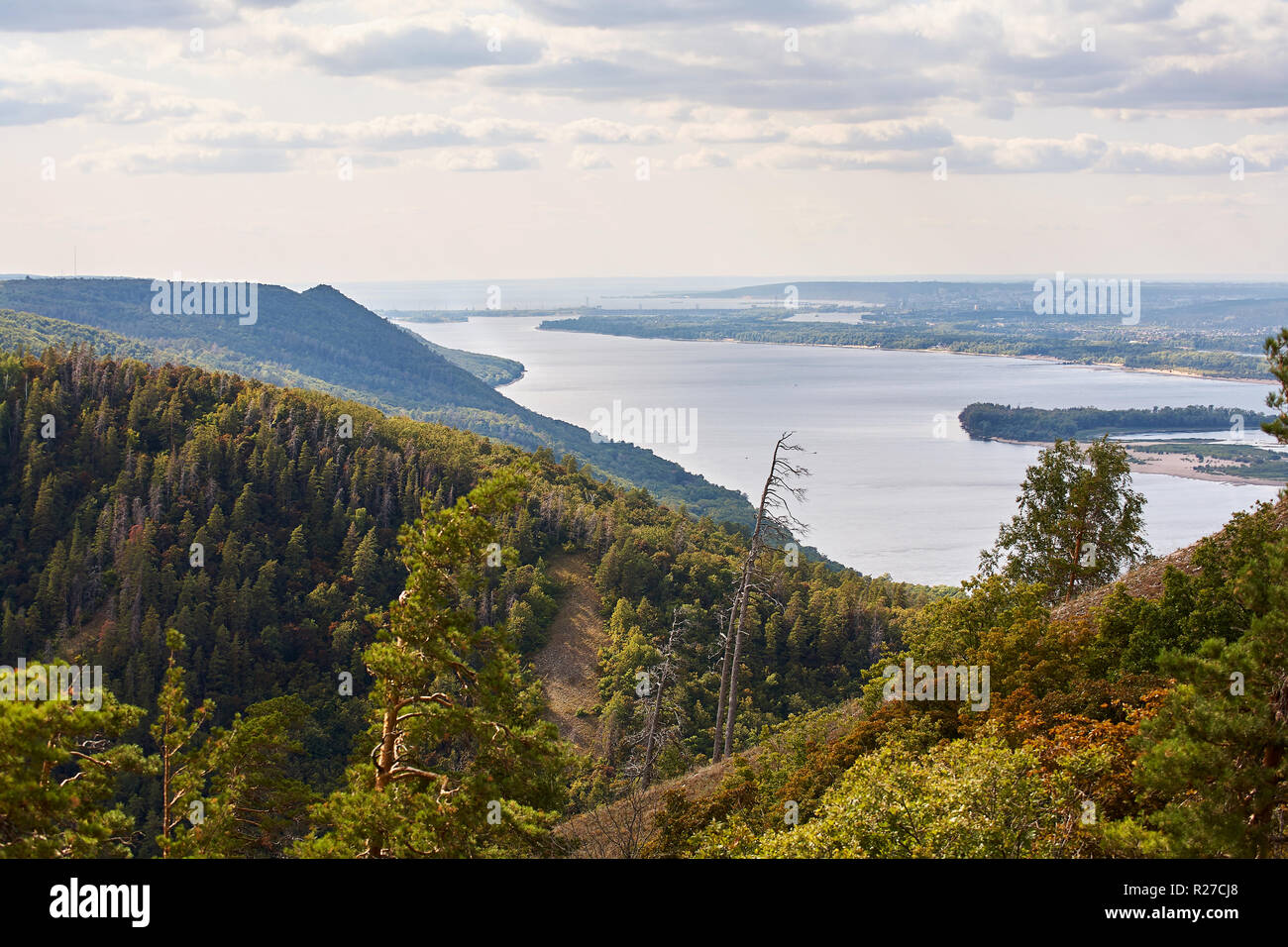 River against the cloudy sky with clouds and forest Stock Photo - Alamy