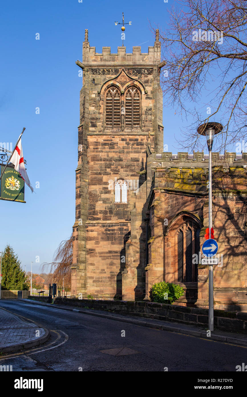 The clock tower at St Michael and All Angels church in Middlewich Cheshire UK Stock Photo