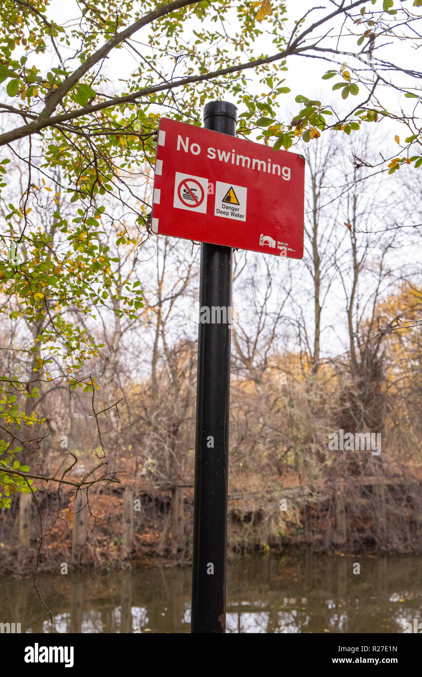 No swimming sign on the banks of the river weaver in Winsford Cheshire UK Stock Photo