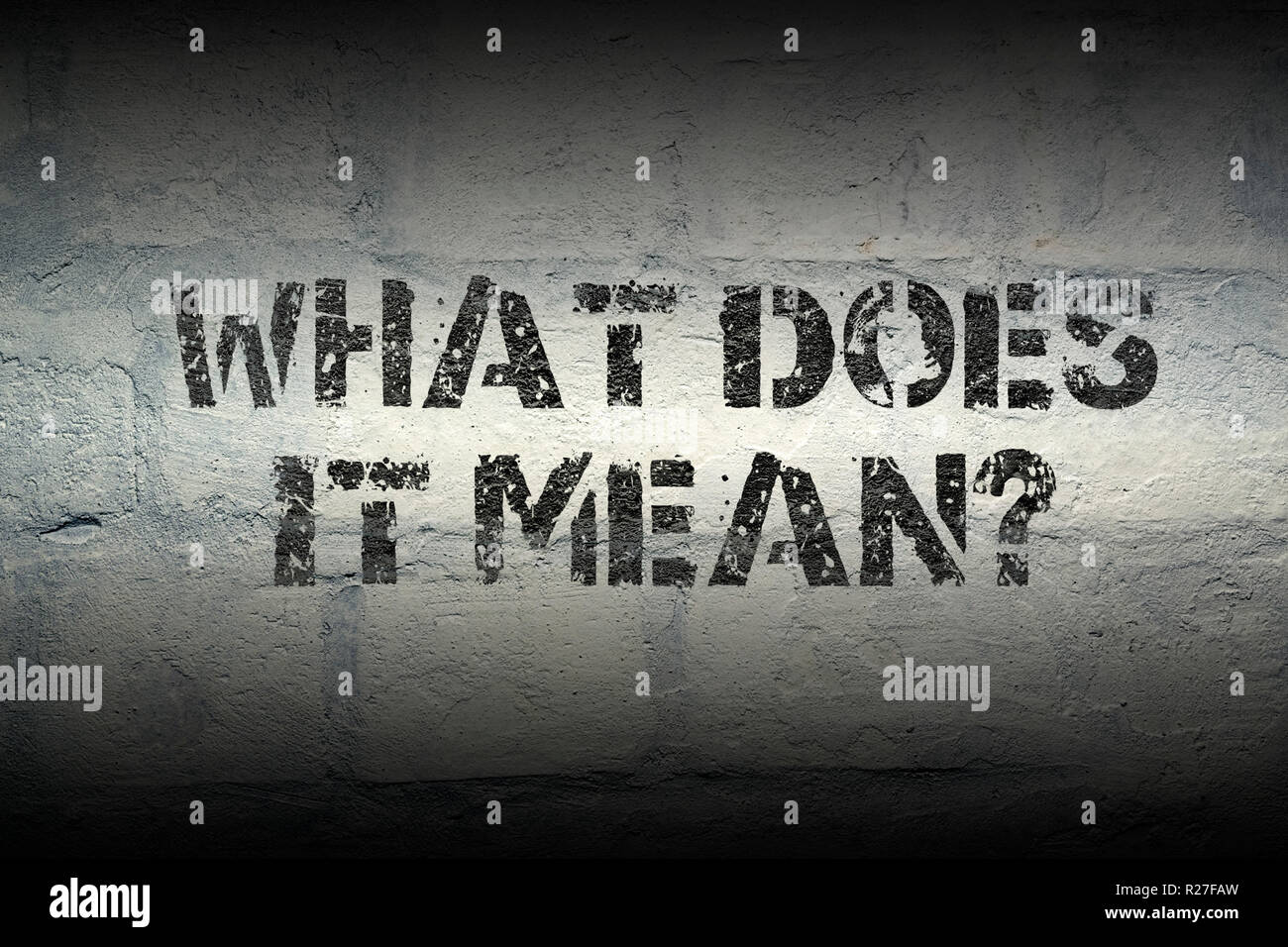 what does it mean question stencil print on the grunge white brick wall