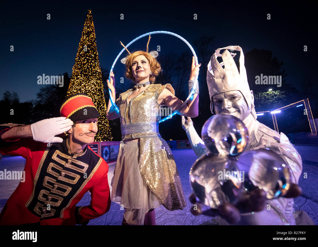 EDITORIAL USE ONLY Festive performers on the ice rink at McArthurGlen