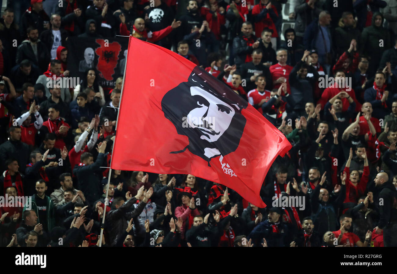Albania fans fly a flag in the stands during the UEFA Nations League, Group C1 match at the Loro Borici Stadium, Shkoder. Stock Photo