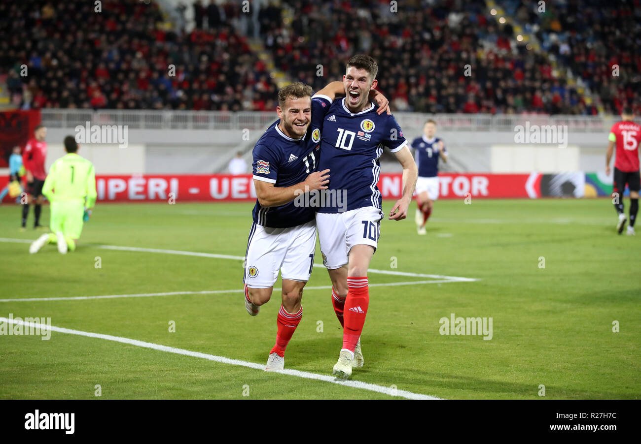 Scotland's Ryan Fraser (left) celebrates scoring his side's first goal of the game with team-mate Ryan Christie during the UEFA Nations League, Group C1 match at the Loro Borici Stadium, Shkoder. Stock Photo