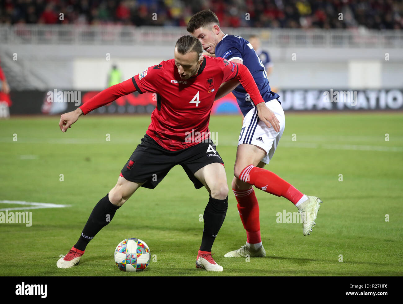 Albania's Adrian Ismaili (left) and Scotland's Ryan Christie battle for the ball during the UEFA Nations League, Group C1 match at the Loro Borici Stadium, Shkoder. Stock Photo