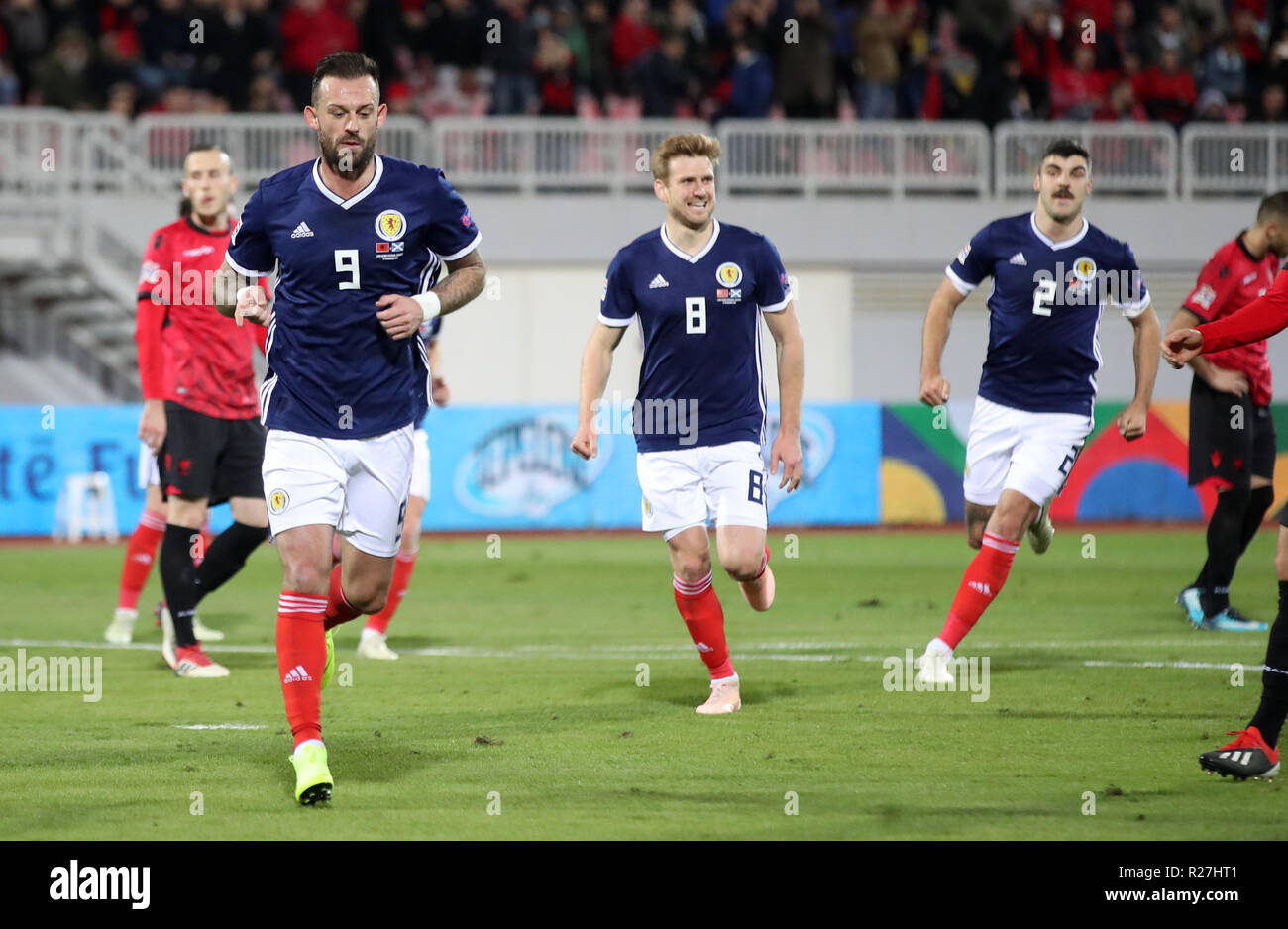 Scotland's Steven Fletcher (left) celebrates scoring his side's second goal of the game from a penalty during the UEFA Nations League, Group C1 match at the Loro Borici Stadium, Shkoder. Stock Photo