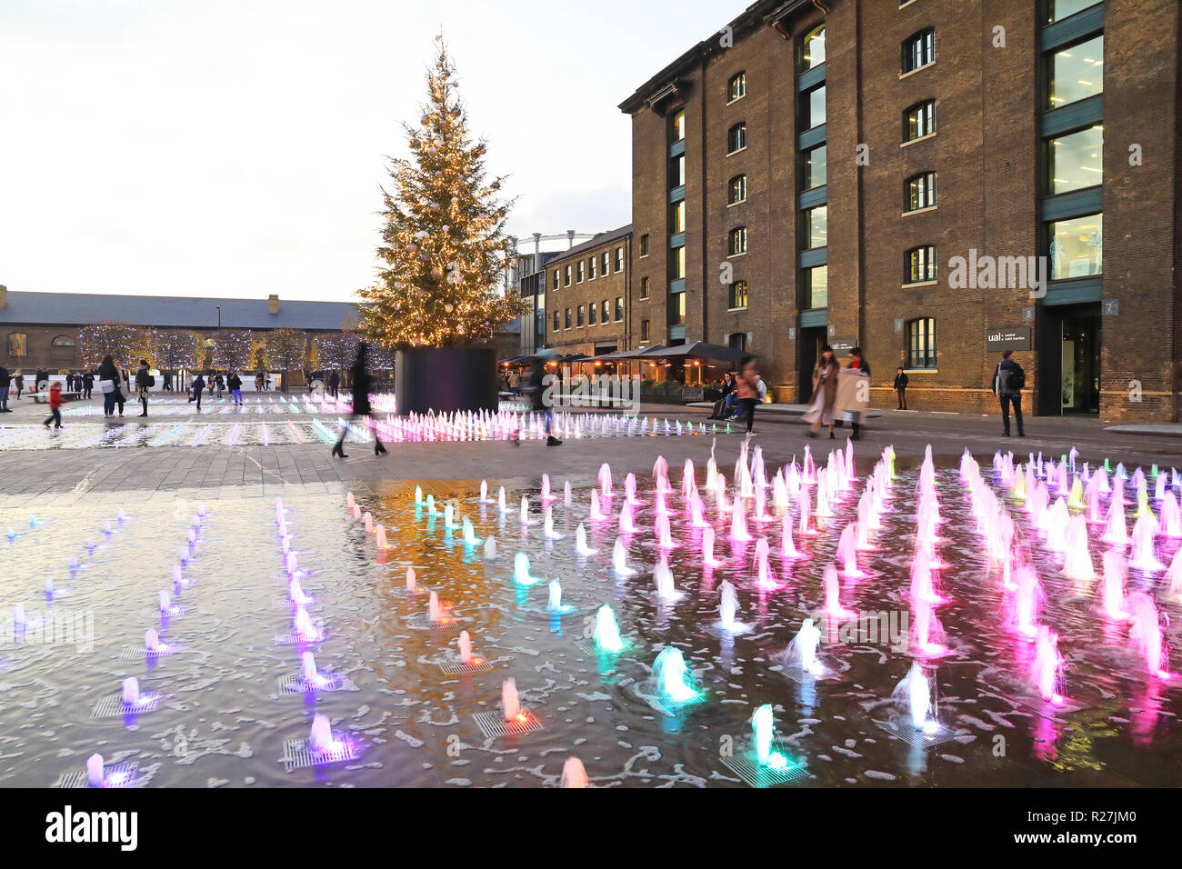 The Christmas tree and coloured fountains in Granary Square, at Kings