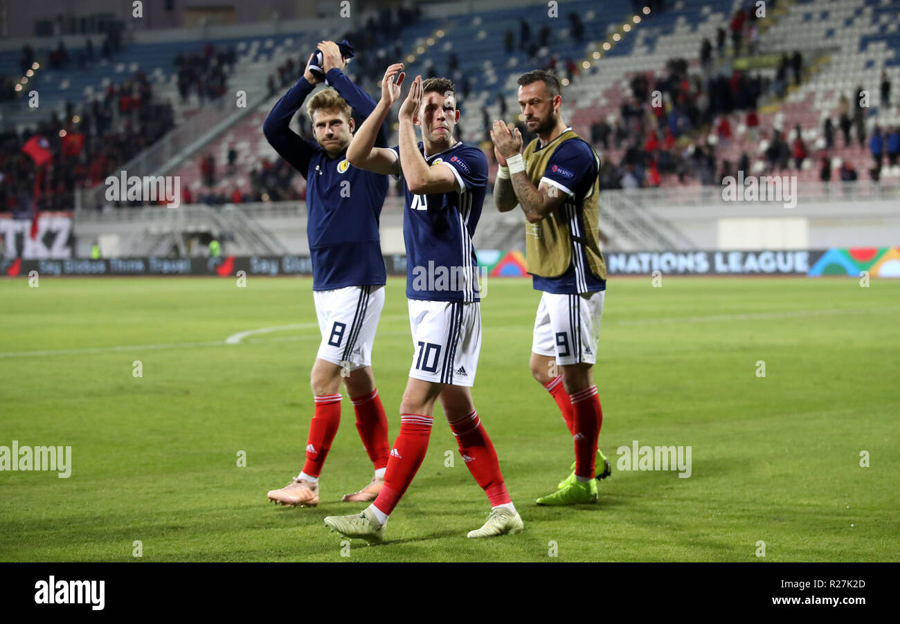 Scotland's Stuart Armstrong, Ryan Christie and Steven Fletcher applaud the fans after the final whistle during the UEFA Nations League, Group C1 match at the Loro Borici Stadium, Shkoder. Stock Photo