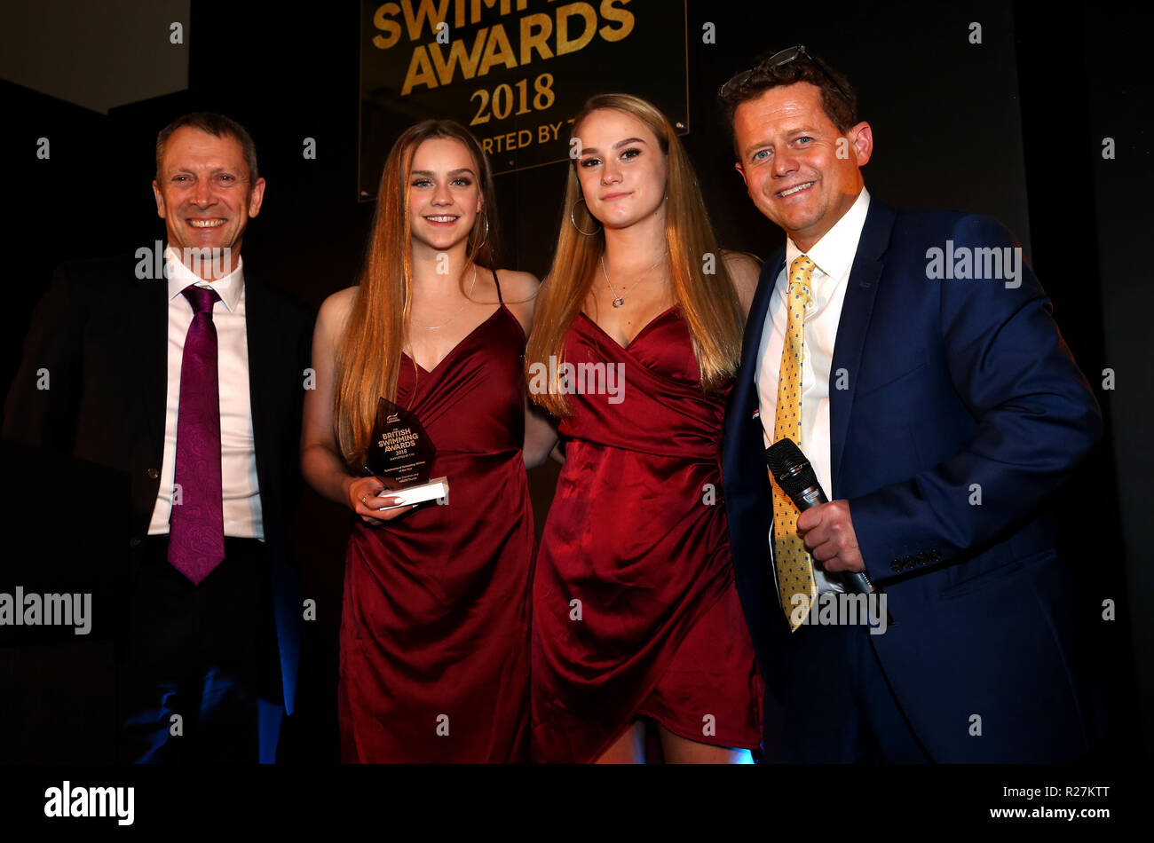 Synchronised Swimming athlete of the year winners Kate Shortman and Isabelle Thorpe (right) with presenter Mike Bushell and award presenter Jack Buckner during the British Swimming Awards 2018 at the Point, Lancashire County Cricket Club, Manchester Stock Photo