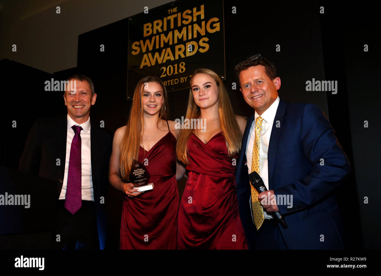 Synchronised Swimming athlete of the year winners Kate Shortman and Isabelle Thorpe (right) with presenter Mike Bushell and award presenter Jack Buckner during the British Swimming Awards 2018 at the Point, Lancashire County Cricket Club, Manchester Stock Photo