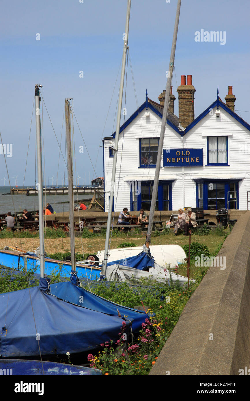 Sailing boats on the beach at the Kent seaside resort of Whitstable a