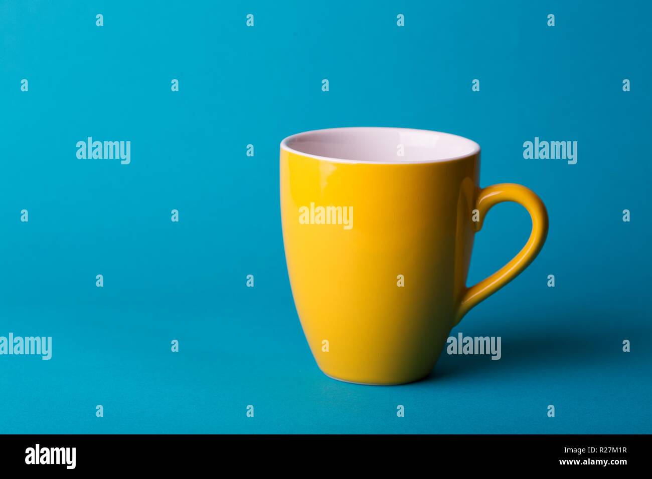 Beautiful Coffee Yellow Cup On Blue Background Stock Photo Alamy
