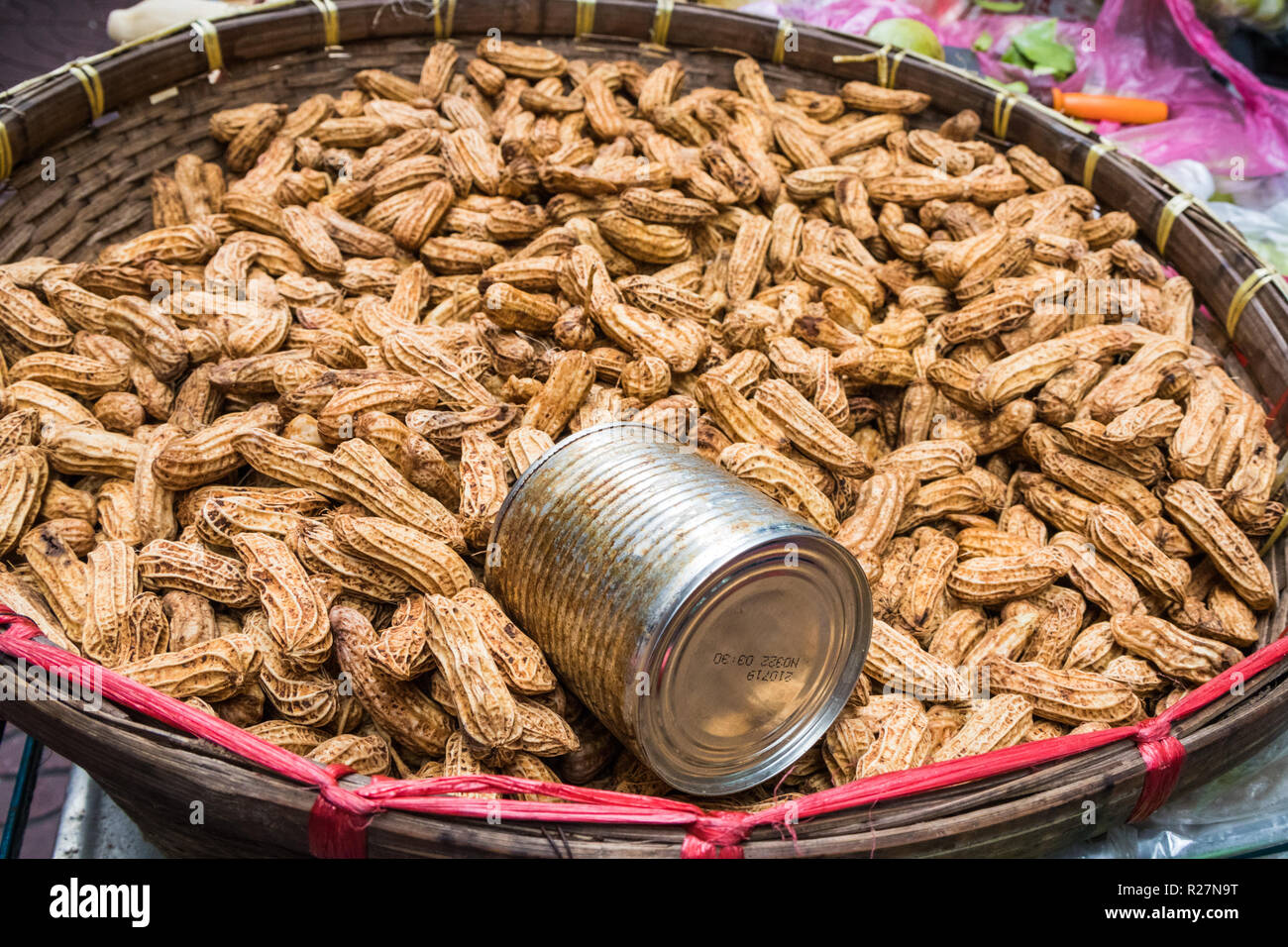Monkey nuts in shells in a basket, Bangkok, Thailand Stock Photo Alamy