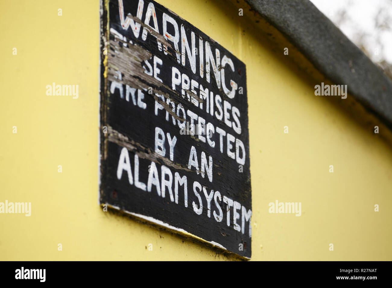 Warning these premises are protected by an alarm system. Stock Photo