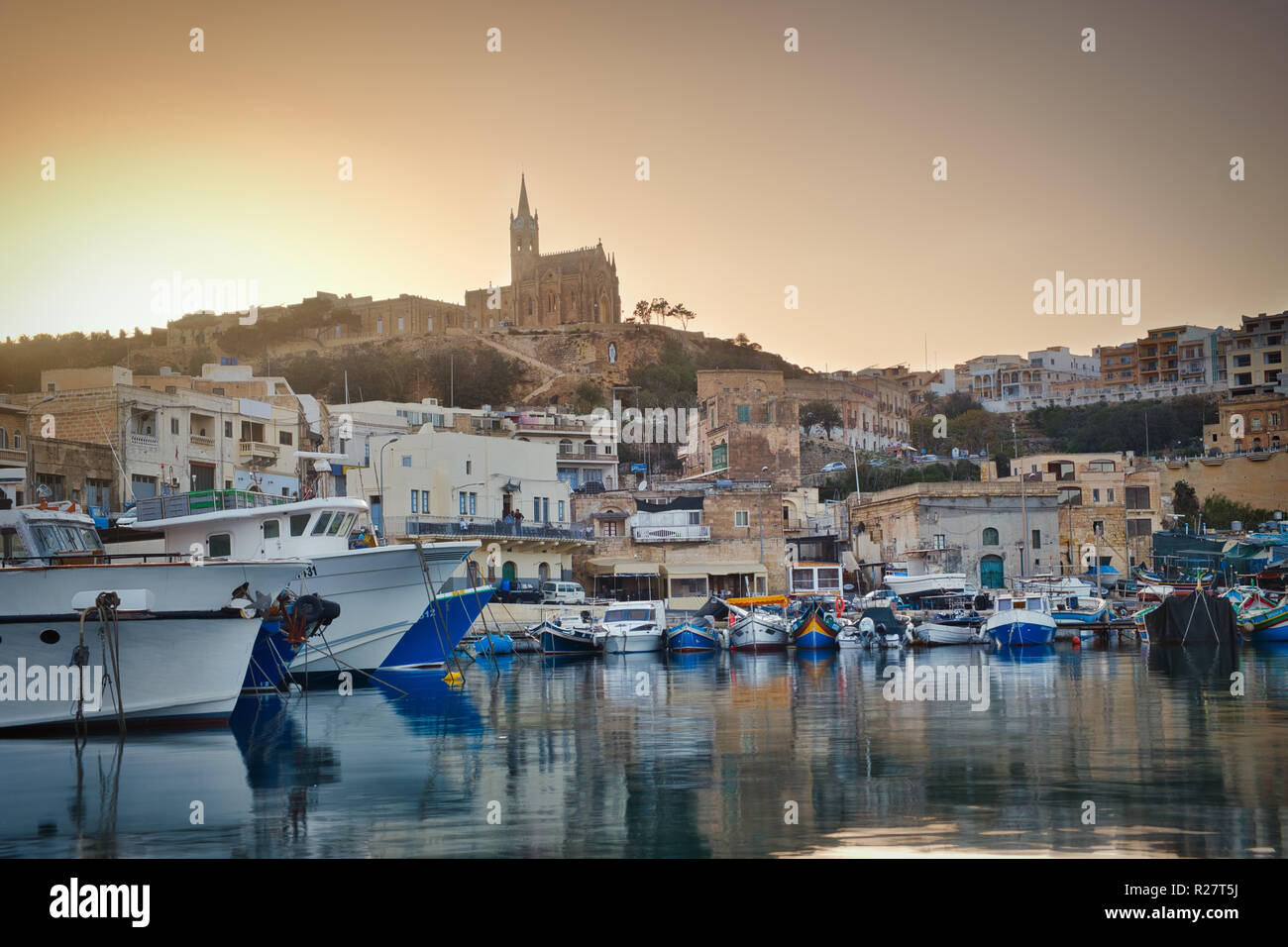 Photo of the Mgarr Village in Gozo Island at the sunset time Stock Photo