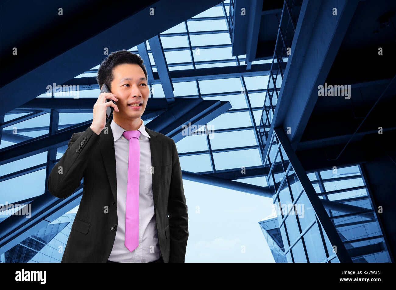 Portrait of asian businessman talking on the phone Stock Photo