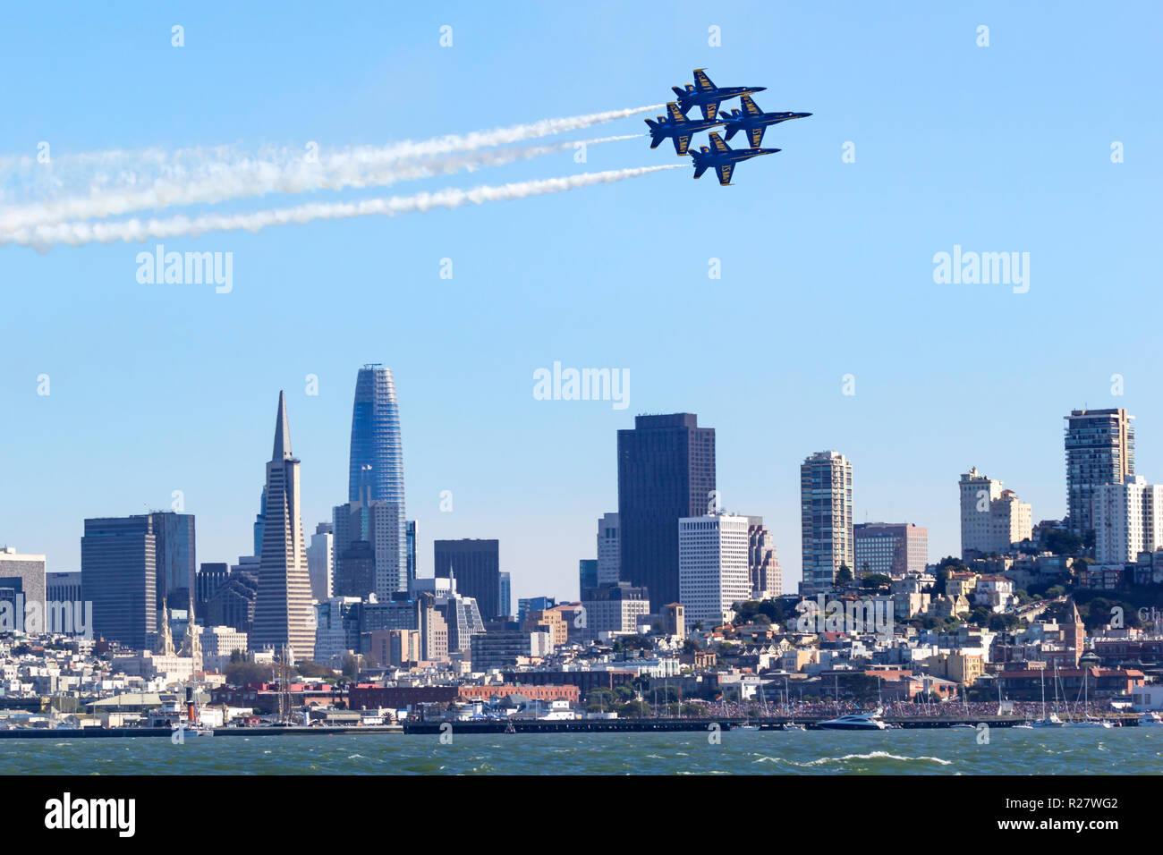 The Blue Angels F/A-18 Hornets in diamond formation pass along the San Francisco Waterfront during San Francisco Fleet Week 2018 Stock Photo