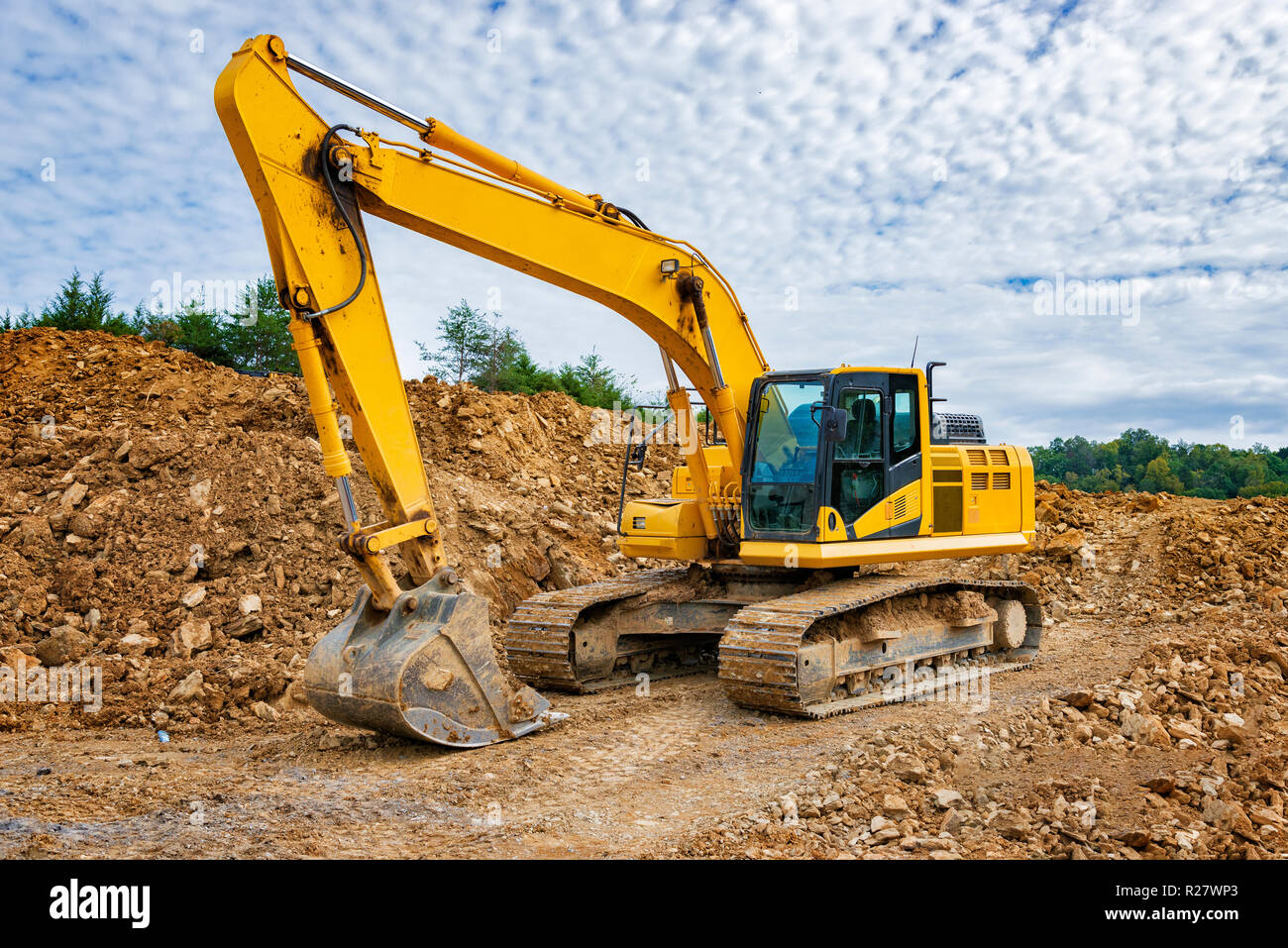 Horizontal shot of Excavator Earth Moving Equipment. NOT CATERPILLER PRODUCT Stock Photo