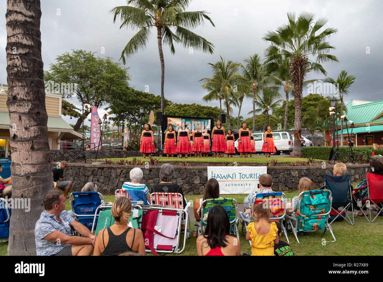 Kailua-Kona, Hawaii - The dancers of Halau Ka’eaikahelelani perform traditional hula at the Coconut Grove Marketplace on Hawaii's Big Island. Stock Photo