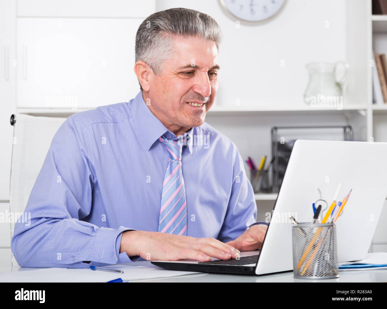 mature-lawyer-examines-important-documents-in-the-office-of-the-law-firm-R283A0.jpg
