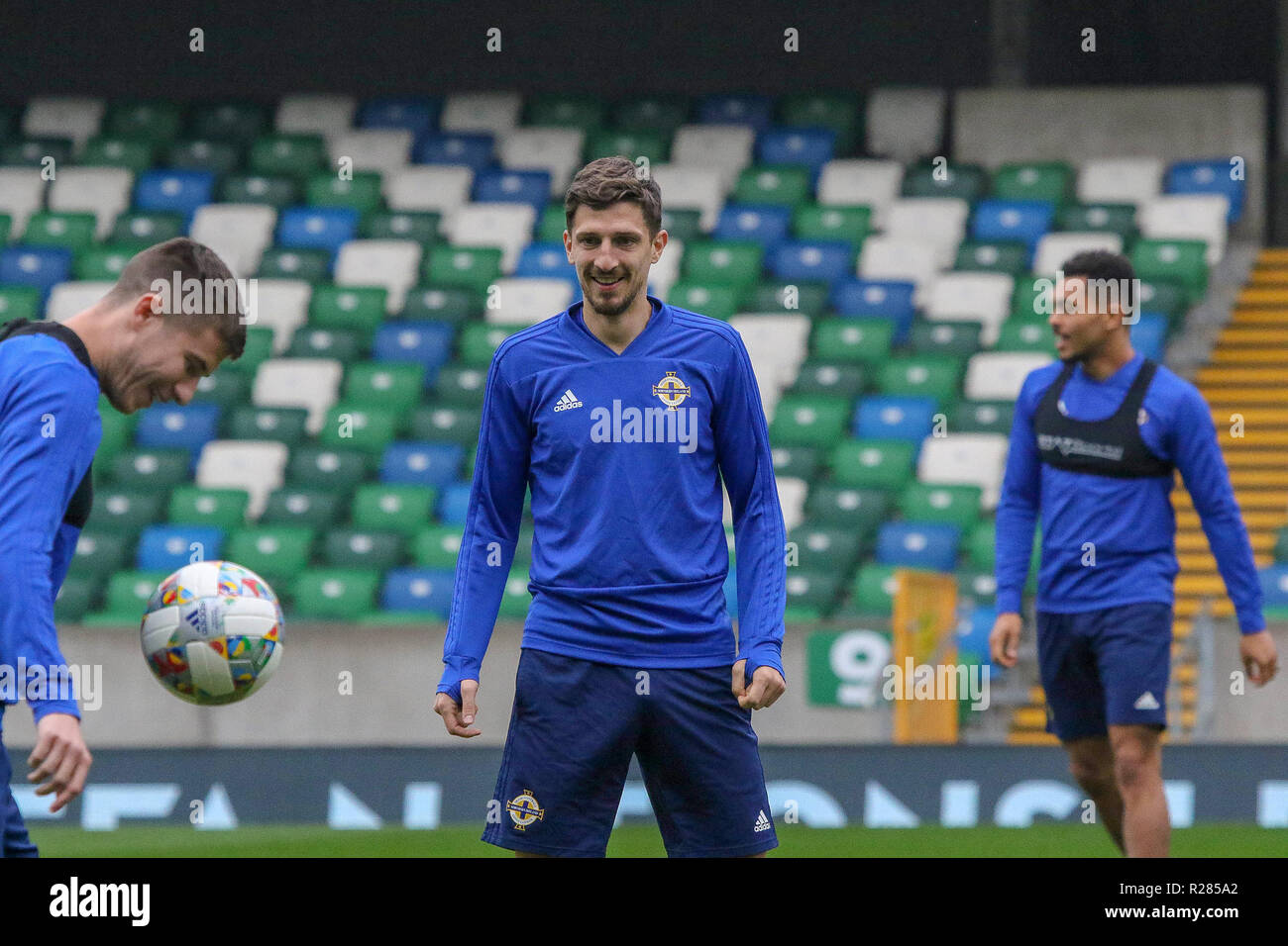 Windsor Park, Belfast, Northern Ireland.17 November 2018. Northern Ireland training in Belfast this morning ahead of their UEFA Nations League game against Austria tomorrow night in the stadium. Craig Cathcart (centre) with Paddy McNair (left). Credit: David Hunter/Alamy Live News. Stock Photo
