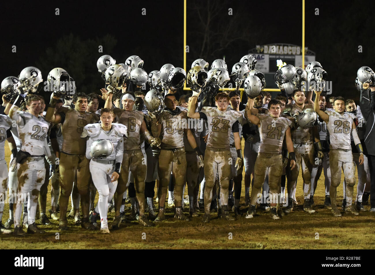 Damascus, Maryland, USA, 16th November 2018. The Oakdale players celebrate a historic win after