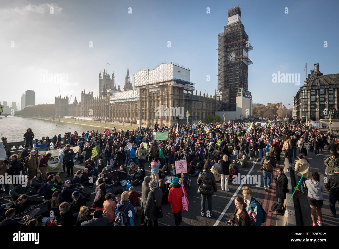 London, UK. 17th November, 2018. Environmental campaigners from Extinction Rebellion block Westminster Bridge, one of five bridges blocked in central London, as part of a Rebellion Day event to highlight 'criminal inaction in the face of climate change catastrophe and ecological collapse' by the UK Government as part of a programme of civil disobedience during which scores of campaigners have been arrested. Credit: Guy Corbishley/Alamy Live News Stock Photo