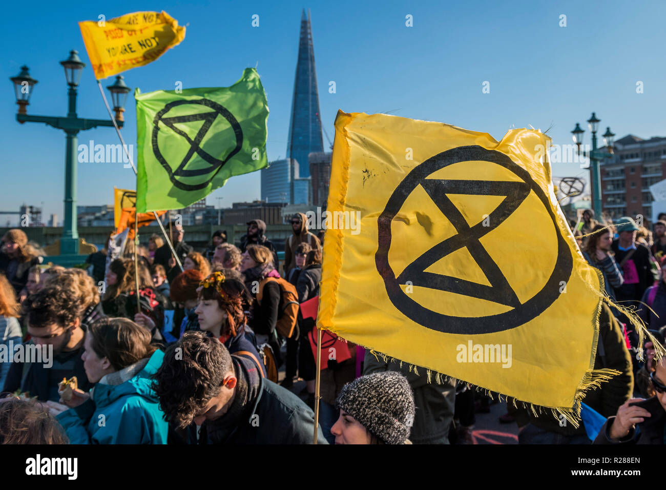 London, UK. 17th November 2018. Southwark Bridge is blocked - Extinction Rebellion Day -  co hosted by Rising Up, 'Rebel Against the British Government For Criminal Inaction in the Face of Climate Change Catastrophe and Ecological Collapse'. A protest that involves blocking 5 bridges: Southwark, Blackfriars, Waterloo, Westminster and Lambeth. Credit: Guy Bell/Alamy Live News Stock Photo
