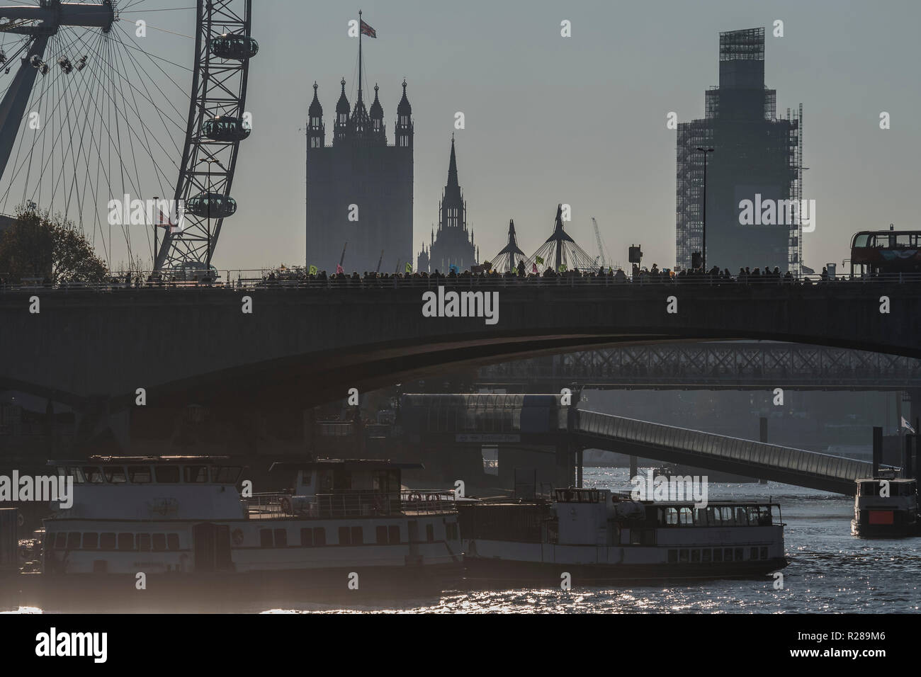 London, UK. 17th November 2018. Waterloo Bridge is blocked - Extinction Rebellion Day -  co hosted by Rising Up, 'Rebel Against the British Government For Criminal Inaction in the Face of Climate Change Catastrophe and Ecological Collapse'. A protest that involves blocking 5 bridges: Southwark, Blackfriars, Waterloo, Westminster and Lambeth. Credit: Guy Bell/Alamy Live News Stock Photo