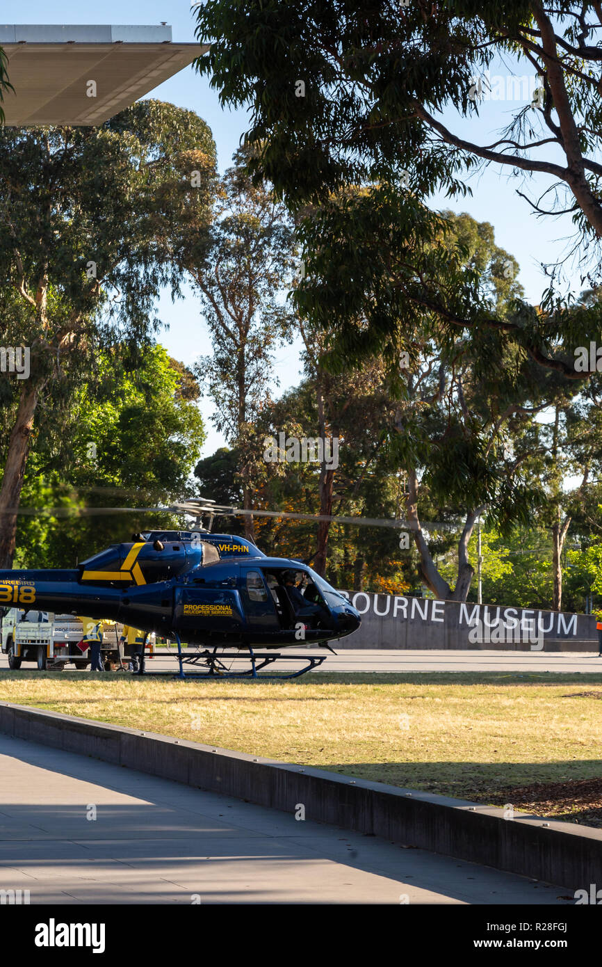 Melbourne, Australia. 18th Nov, 2018. Carlton residents will awaken to a spectacular sight this weekend as a low-flying helicopter works to carefully manoeuvre crates of solar panels from the grounds of the Carlton Gardens precinct to the roof of the iconic Melbourne Museum building.  Partnering with global technology company Siemens Ltd, Museums Victoria is in the process of installing over 2,700 solar panels, creating a 1083kW solar array - the biggest solar array in metropolitan Melbourne. Credit: Dave Hewison Sports/Alamy Live News Stock Photo