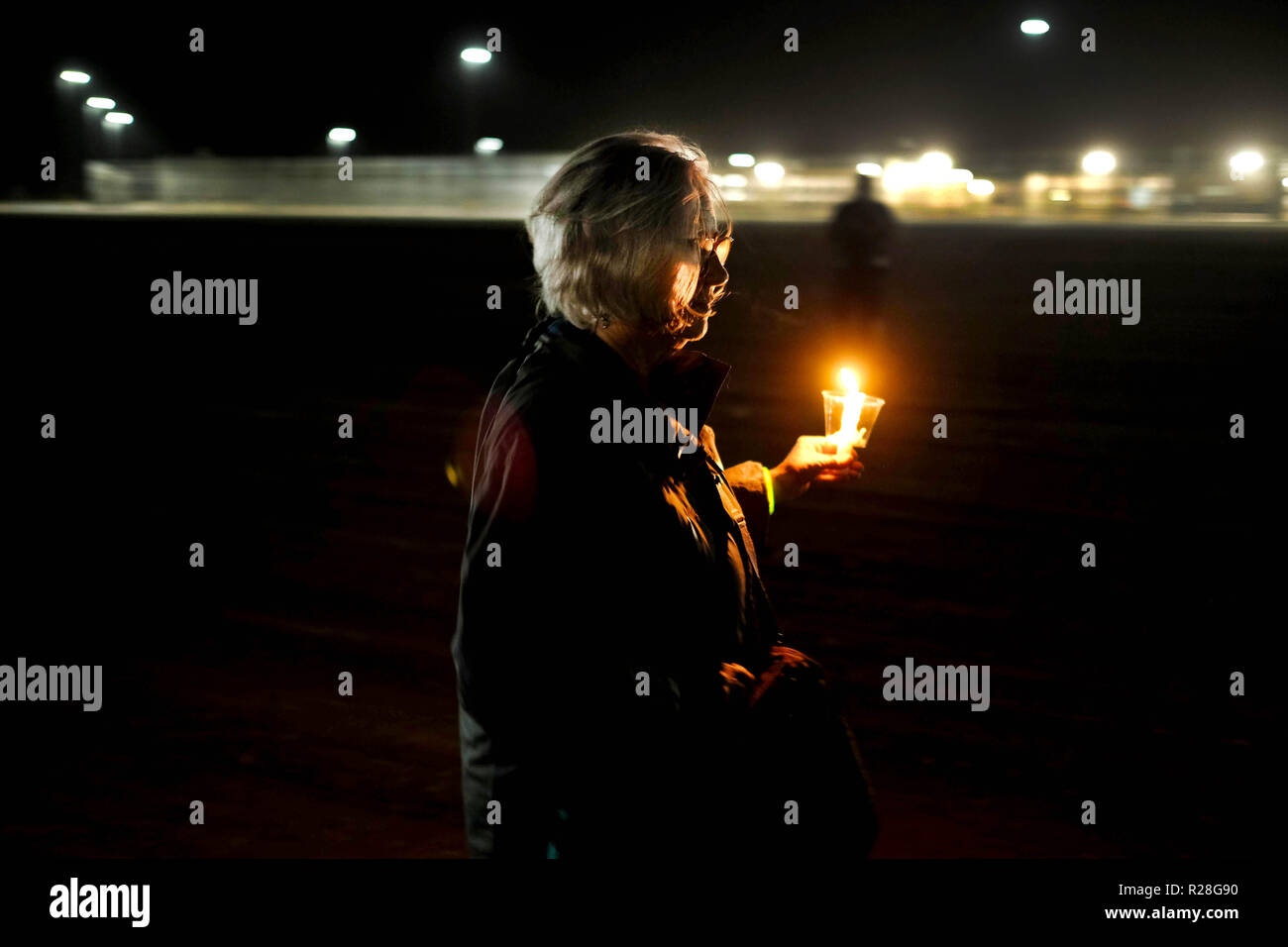 Eloy, Arizona, USA. 16th Nov, 2018. Candlelight vigil at the Eloy Detention Center in Eloy, Arizona. Eloy is a private prison owned and operated by CoreCivic under a contract with US Immigration and Customs Enforcement. Illegal immigrants are held at the facility while they await a hearing before a judge . The protest was organized by the Puente Human Rights movement to highlight conditions at the prison and the illegal incarceration of detainees. Supporters called for the abolishment of I.C.E and rights of migrants. Credit: Christopher Brown/ZUMA Wire/Alamy Live News Stock Photo