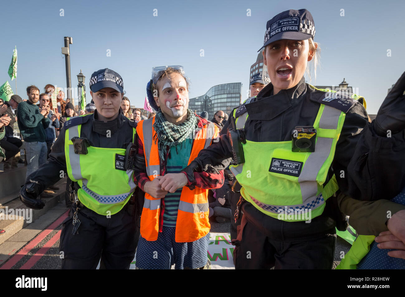 London, UK. 17th November, 2018. Environmental campaigners from Extinction Rebellion block Lambeth Bridge, one of five bridges blocked in central London, as part of a Rebellion Day event to highlight 'criminal inaction in the face of climate change catastrophe and ecological collapse' by the UK Government as part of a programme of civil disobedience during which scores of campaigners have been arrested. Credit: Guy Corbishley/Alamy Live News Stock Photo