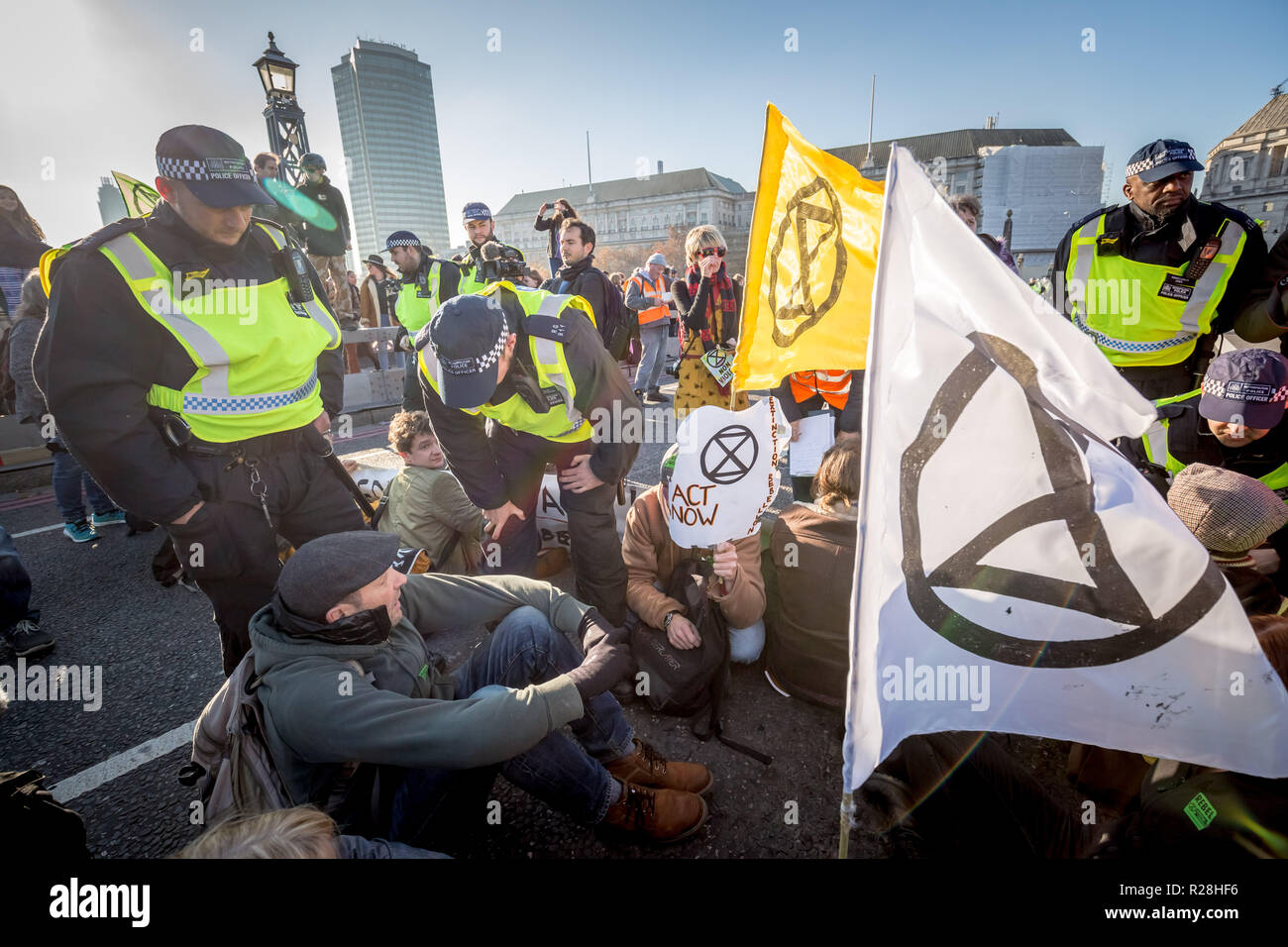 London, UK. 17th November, 2018. Environmental campaigners from Extinction Rebellion block Lambeth Bridge, one of five bridges blocked in central London, as part of a Rebellion Day event to highlight 'criminal inaction in the face of climate change catastrophe and ecological collapse' by the UK Government as part of a programme of civil disobedience during which scores of campaigners have been arrested. Credit: Guy Corbishley/Alamy Live News Stock Photo