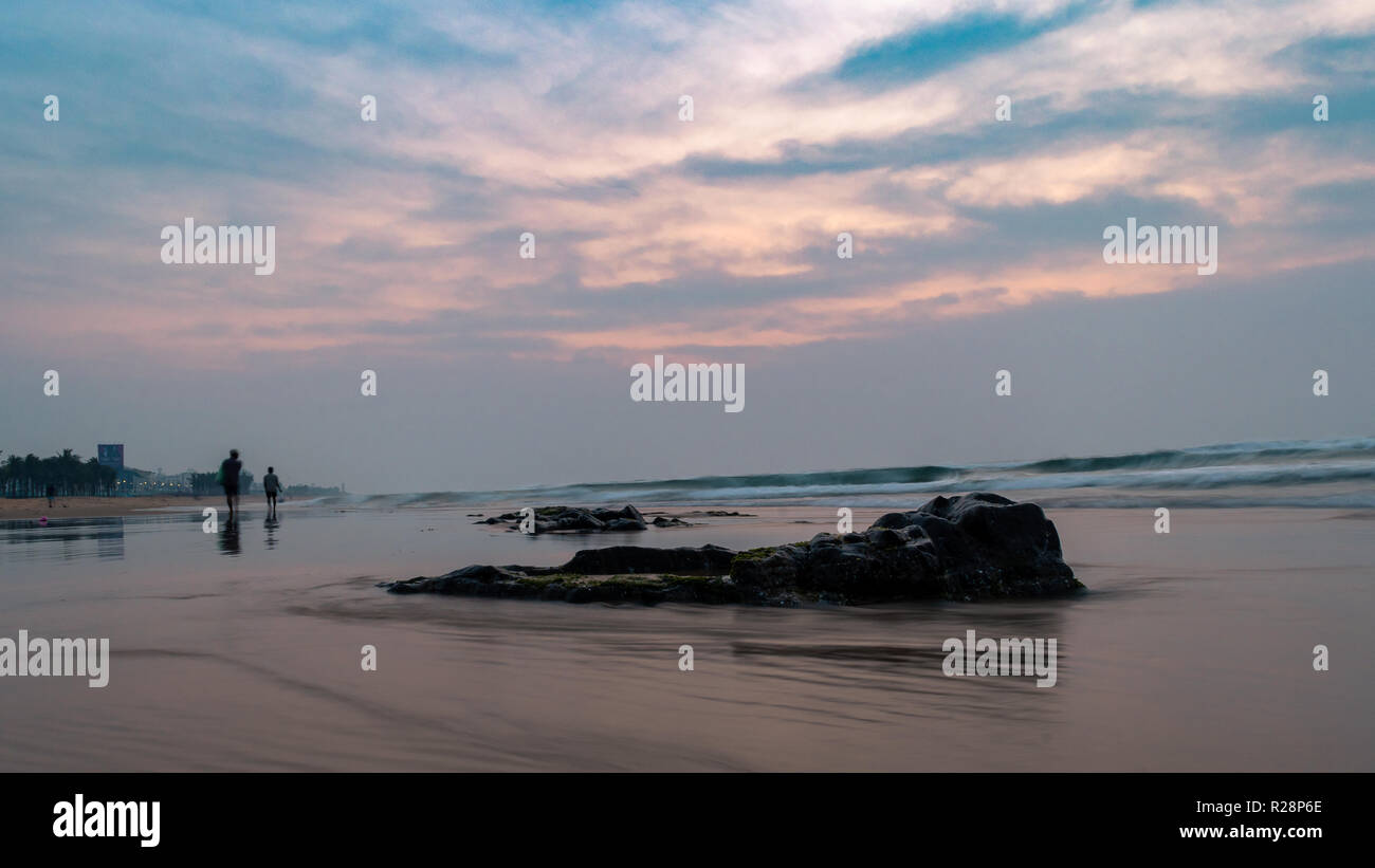 RK Beach or Ramakrishna Beach at the time of Sunrise,  is situated on the East coast of Bay of Bengal in Visakhapatnam.  Slow shutter speed is applied Stock Photo