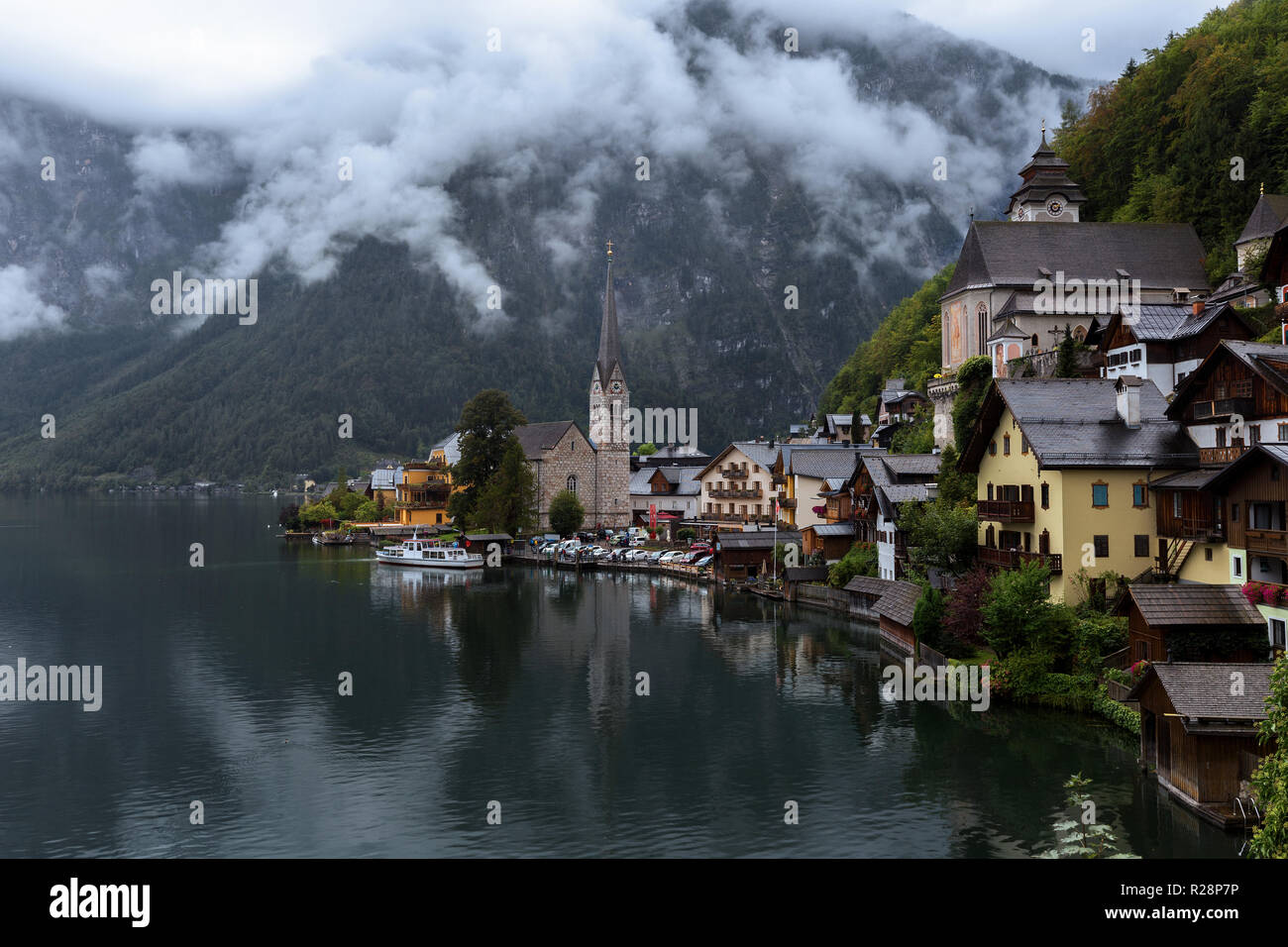 Scenic view of famous Hallstatt mountain village with Hallstatter lake ...