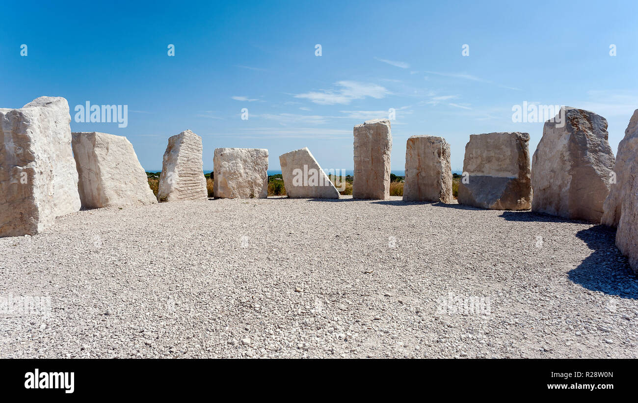A ring of modern standing stones made of Portland stone reminiscent of