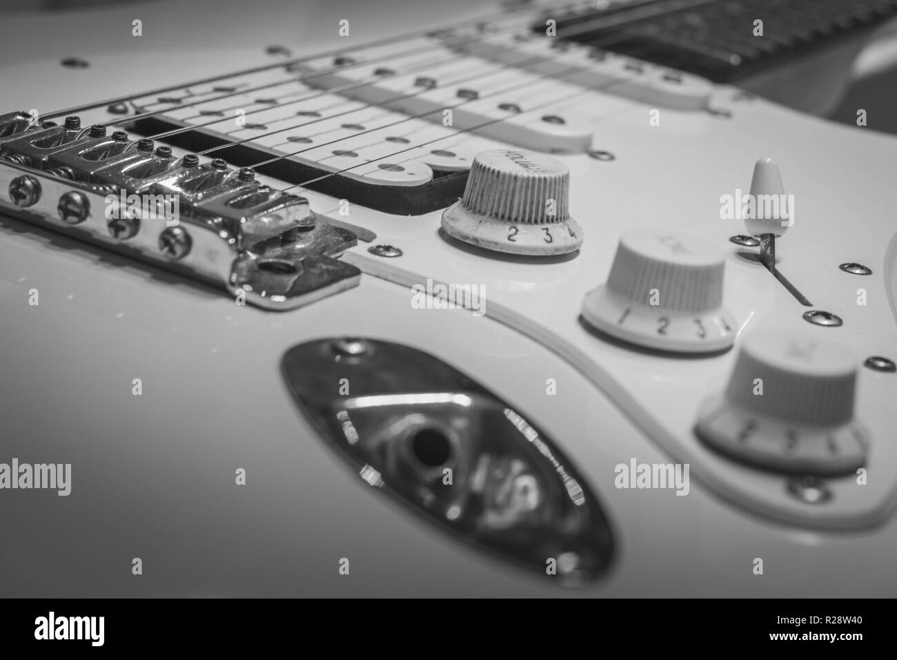 Black white rock music concept, solo electric lead guitar with bridge