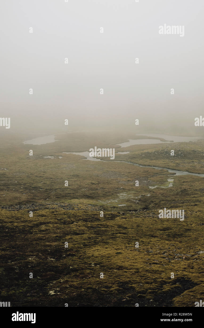 A minimal low cloud landscape of high moorland in the remote Westfjords of Iceland - Iceland minimalism Stock Photo