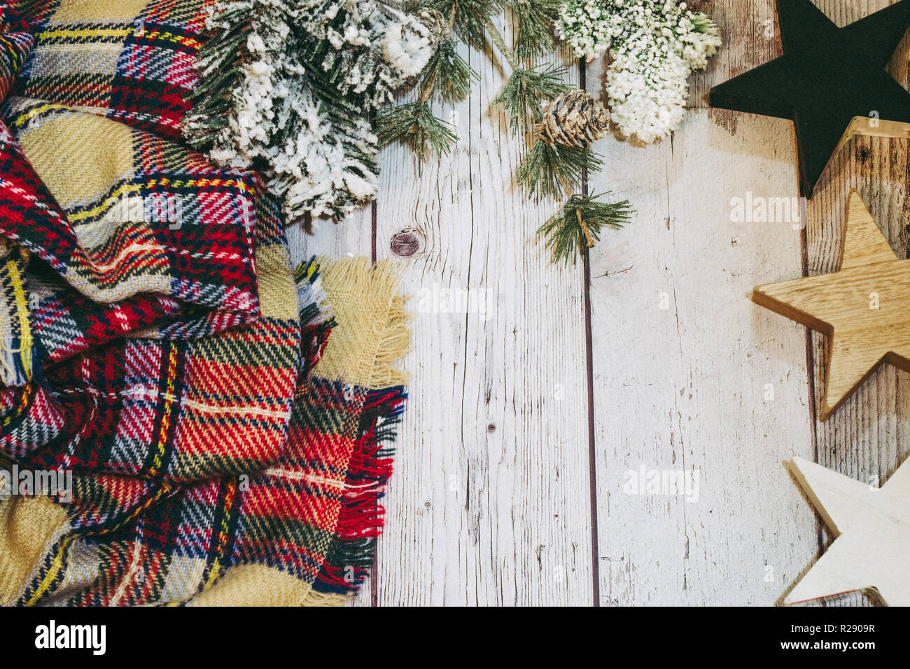 Cozy Plaid Blanket On A Wooden White Background With Christmas Branches And Snow With Wooden Stars Lots Of Space For Text Useful For The Christmas H Stock Photo Alamy