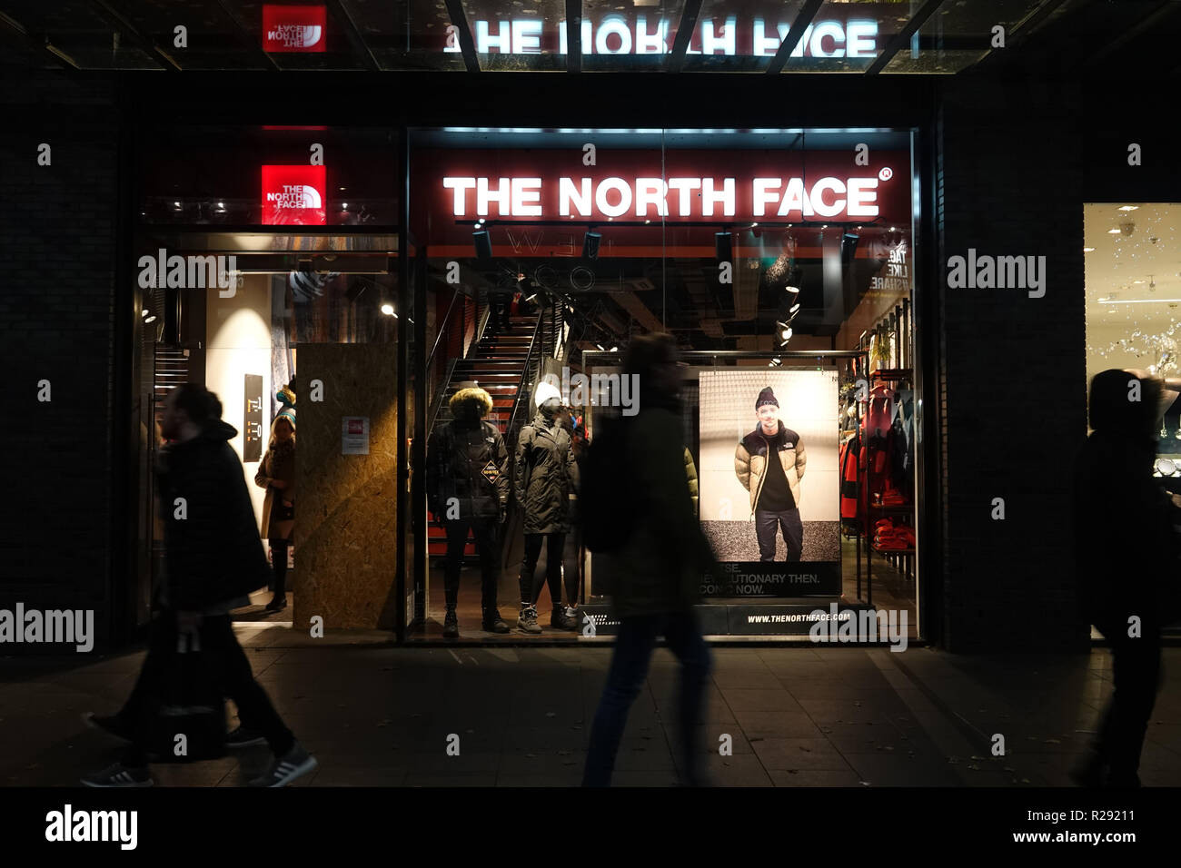 People in silhouette walking past a The North Face store in Liverpool One  shopping complex at night. Liverpool UK. November 2018 Stock Photo - Alamy