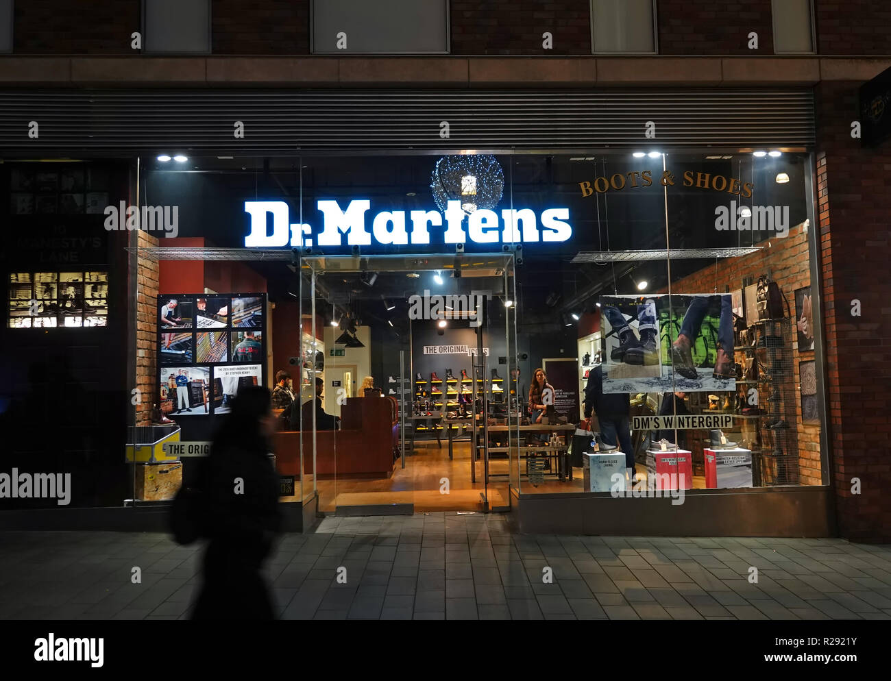 People in silhouette walking past a Dr Martens store in Liverpool One  shopping complex at night. Liverpool UK. November 2018 Stock Photo - Alamy